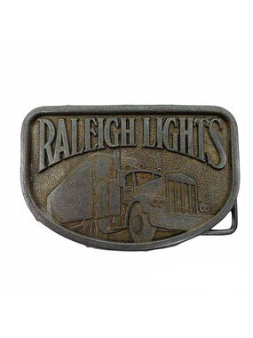 Vintage Raleigh Lights Belt Buckle Metal Trucker Semi Truck 18 Wheeler